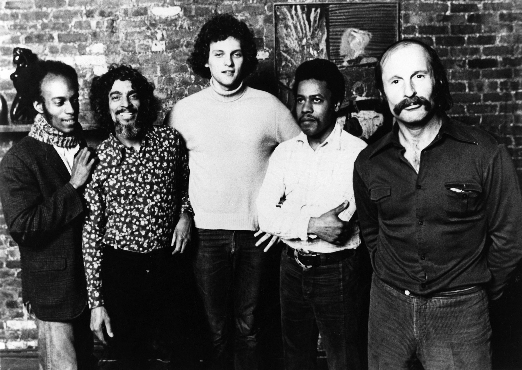 The second incarnation of Weather Report (<i>I Sing the Body Electric</i> and <i>Sweetnighter</i>) before turbulence broke the band apart. (left to right) Eric Gravatt, Dom Um Romao, Miroslav Vitous, Wayne Shorter, and Joe Zawinul. Photo via Echoes/Redferns.